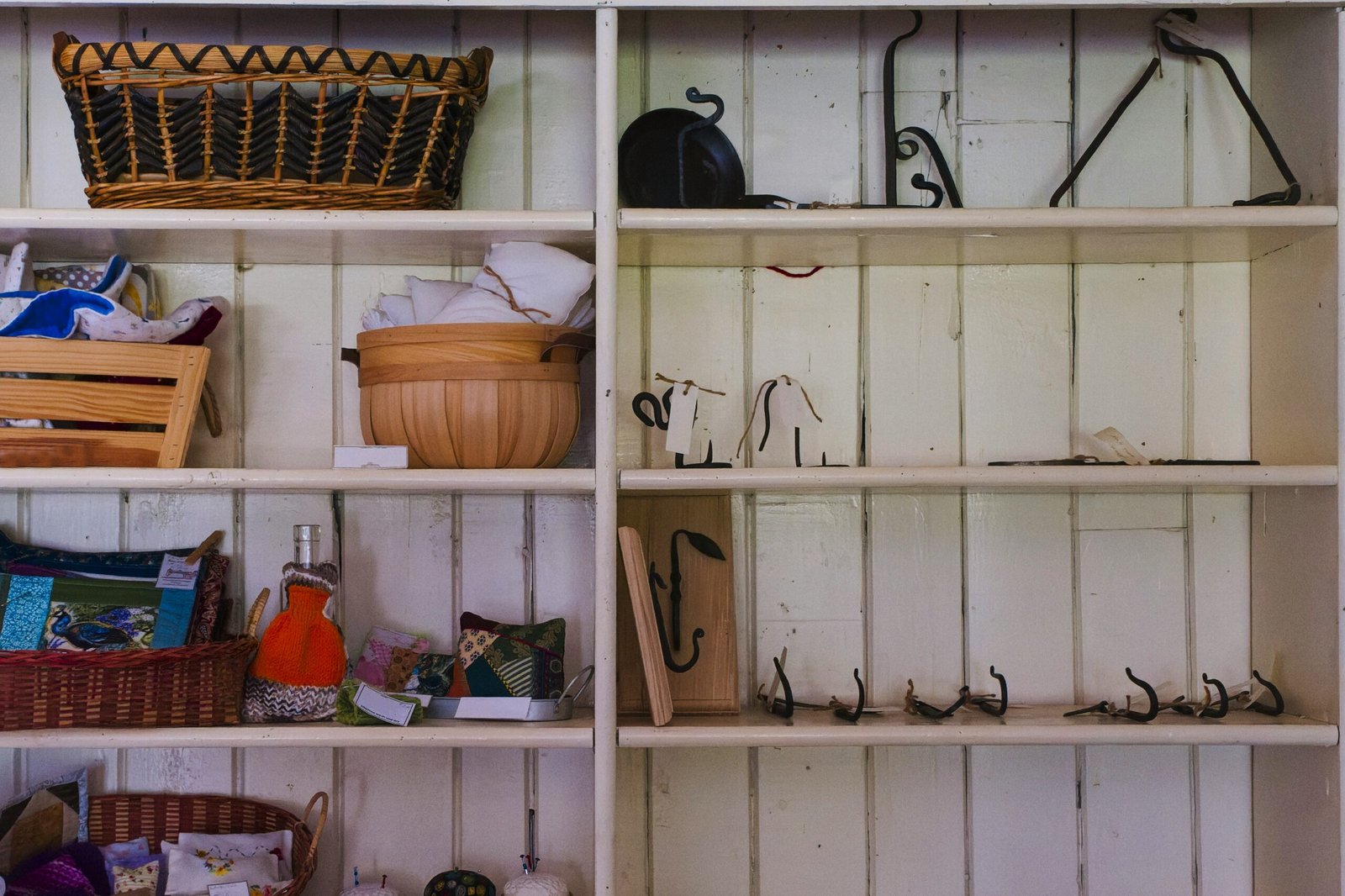 a shelf filled with lots of different types of items